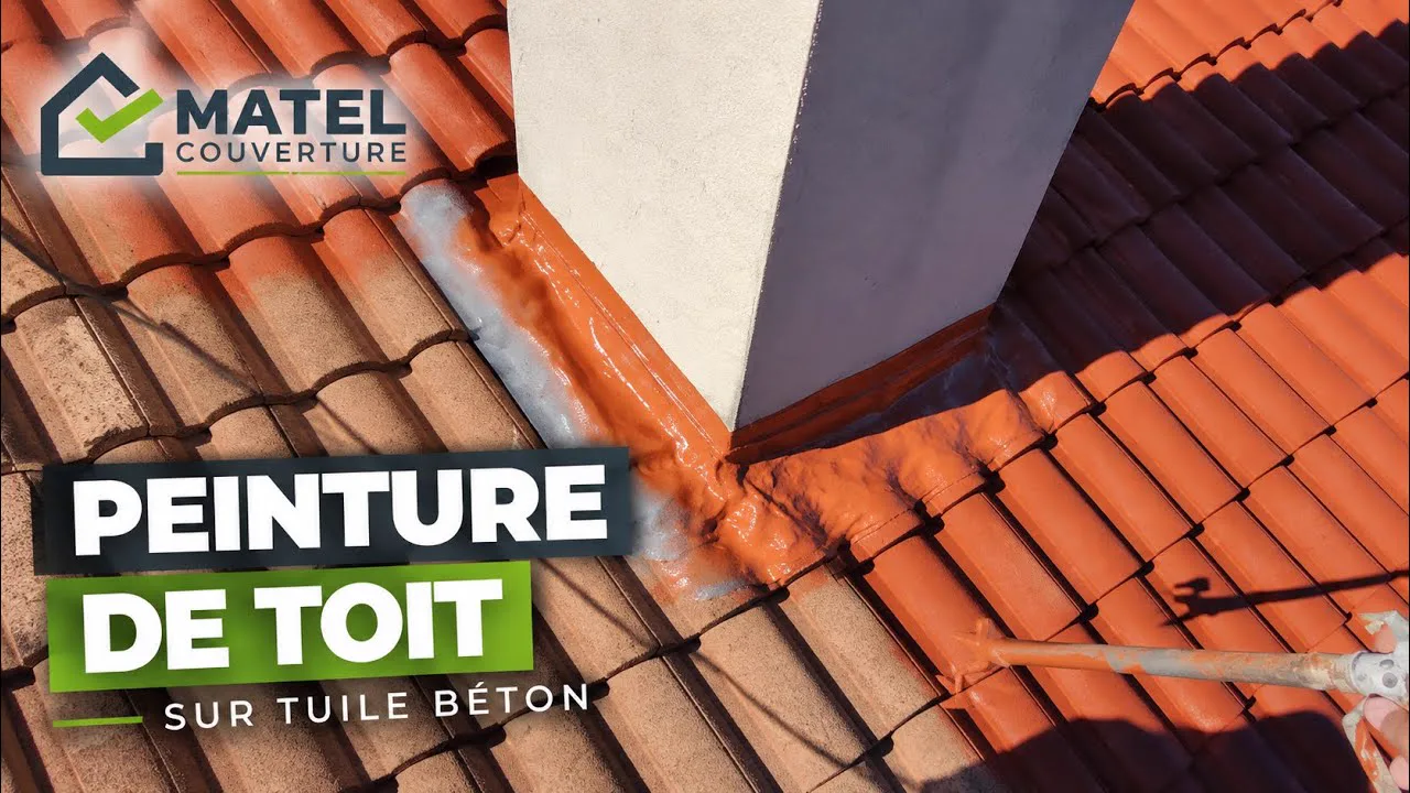 Peinture appliquée autour d'une souche de cheminée sur une toiture en tuiles béton
